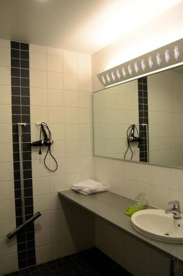 Фото номера Двухместный номер с 2 отдельными кроватями Отель Hotel Tuulonen г. Tuulos 4